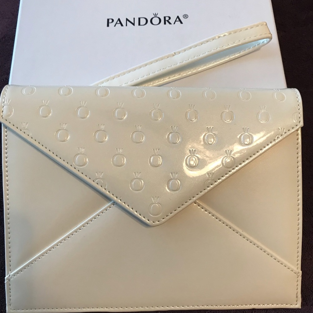 New cream colored clutch